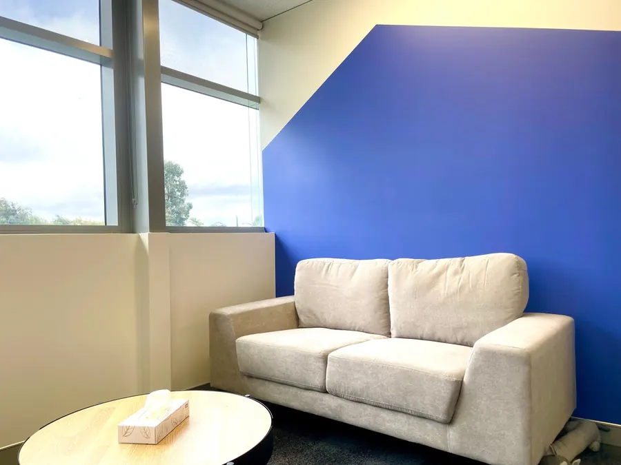 A quiet consulting room with a couch